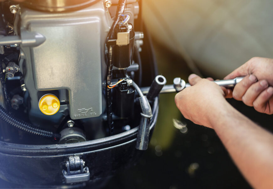 Mechanic,Repairing,Inflatable,Motorboat,Engine,At,Boat,Garage.,Ship,Engine